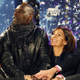 Paris mayor Anne Hidalgo and actor Omar Sy switch on the Christmas lights on the Champs Elysees in Paris on Nov. 20, 2014.